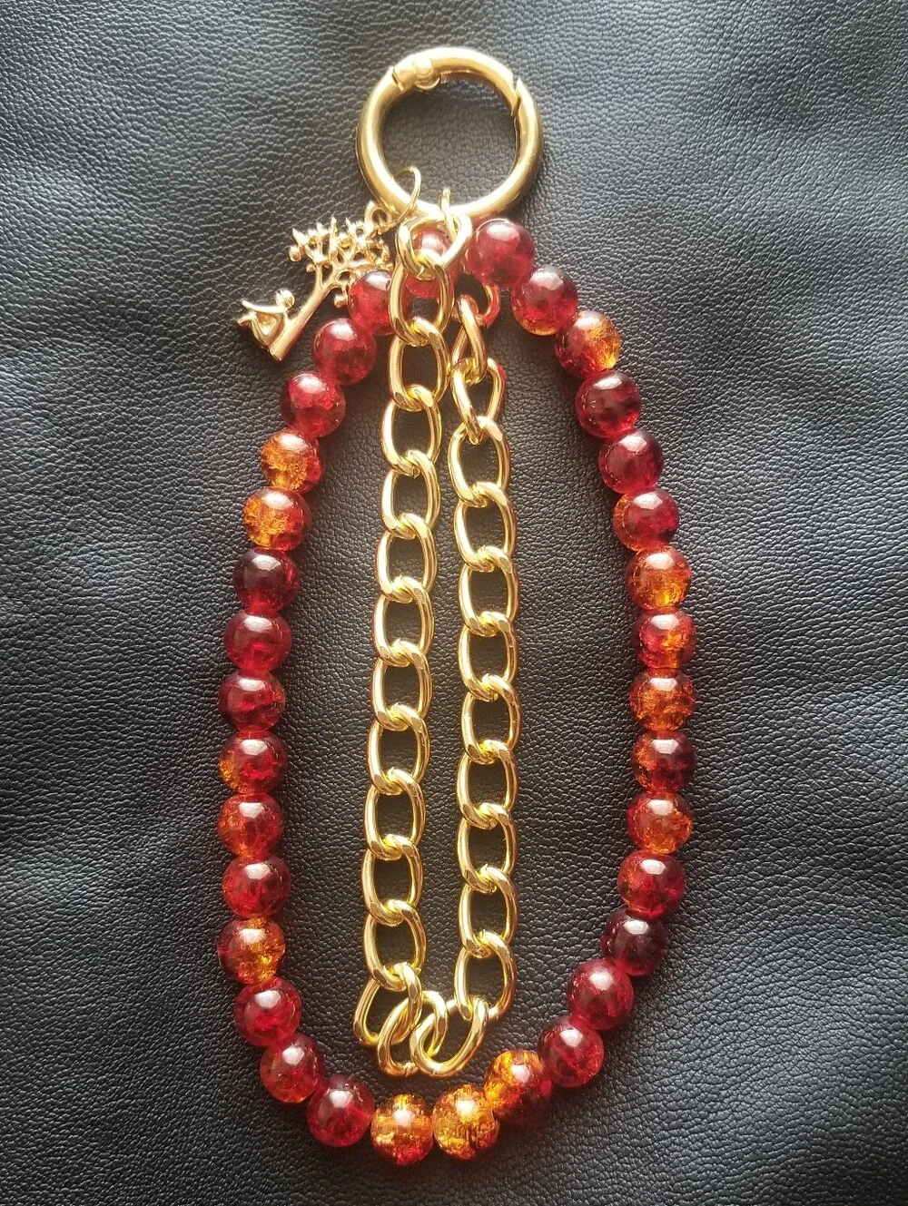 Gold Chain Bracelet Phone Charm with Red and Amber Faceted Beads